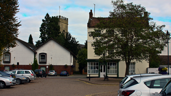 The Market Square in Stony Stratford looking to east side of Square is the Library formerly two large houses. Photo taken in 2010 by Stephen Flinn
