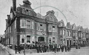 Men outside the Working Men's Club, Wolverton early C20th