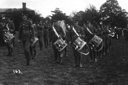 Slide of a military band on parade.