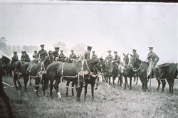 Slide of mounted officers and troops.