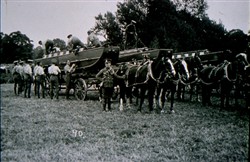 Slide of barges loaded on Horse-drawn wagons.