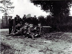 Photograph of a machine gun team.
