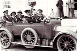 Photograph of soldiers in a car