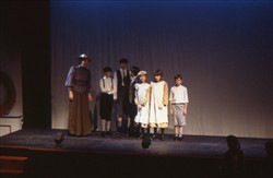 Slide of 6 children and a woman