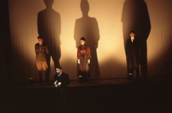 Slide of a woman, officer and man on the stage