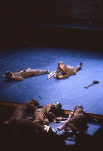 Slide of soldiers lying on the floor.