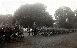 Photograph showing a company/battalion marching