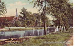 Photographic postcard "St Peters from the River Staines"