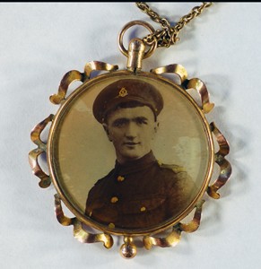 Pendant necklace containing photographs of Ted and Charlie Williams