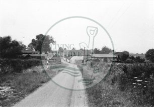 Photograph of country road and farm (1971).