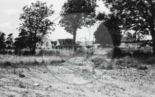 Photograph of Old Bradwell church and Manor Farm (1971).