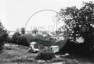 Photograph of heavy machinery in fields south of Stony Stratford (1971).