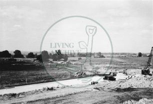 Photograph of building site alongside A5 road at Stony Stratford (1971).