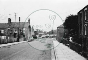 Photograph of New Bradwell street with terraced houses (1971).