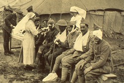 Slide of nurses attending to wounded soldiers