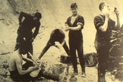 Slide of a photograph of five soldiers shaving