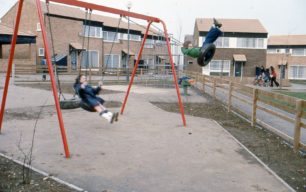 Two little girls on swings in Eaglestone