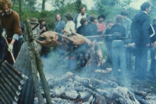 Ben Collins roasting the pig