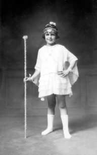 Girl in costume for Charlie Scott's Pantomime.