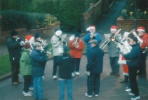 Bradwell Silver Band, performing outdoors at Christmas.