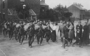 Photograph of a parade of military drummers in New Bradwell