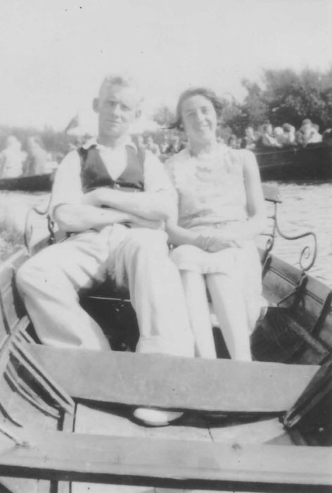Joe and Agnes Scrags in a rowing boat.