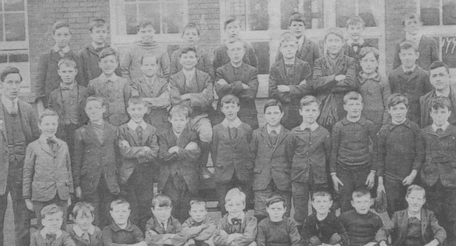 Newspaper picture of boys school group.