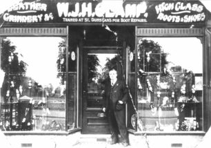 W J H Clamp's shop front, with the man himself, possibly in the  High Street.