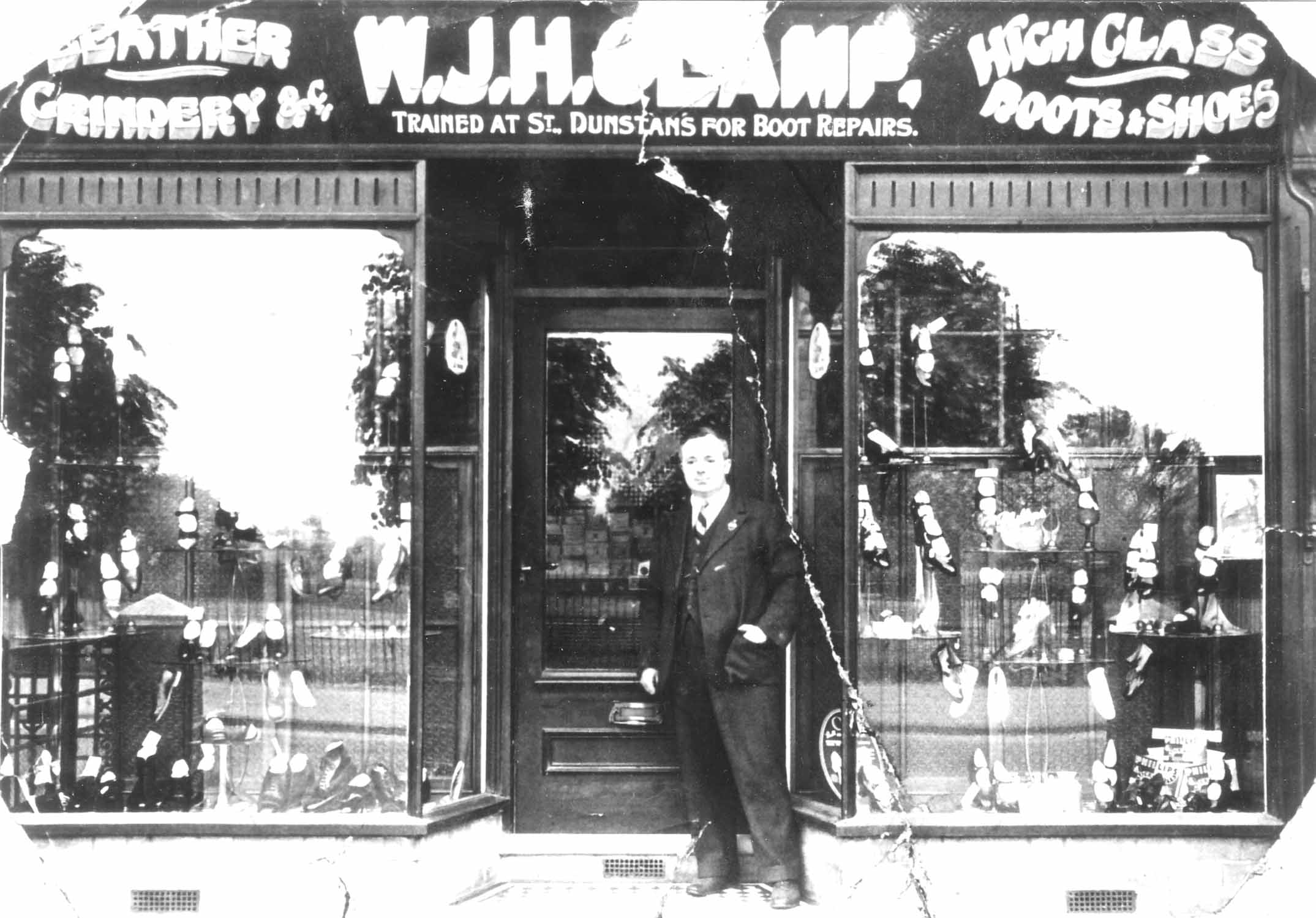 W J H Clamp's shop front, with the man himself, possibly in the High ...
