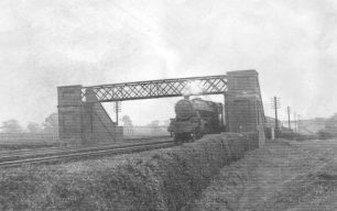 Steam Train under footbridge at Old Bradwell