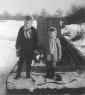 Graham & Andrew Crisp in 1963 Winter snow on a canal boat.