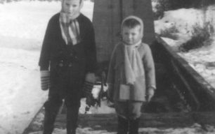 Graham & Andrew Crisp in 1963 Winter snow on a canal boat.