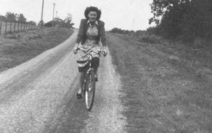 Mrs Olwen Crisp cycling along Little Linford Lane.