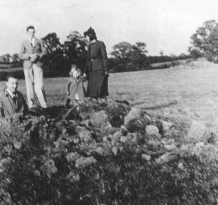George Clarke, Ron Shouler, Norma Clarke, Mrs May Clarke nee Shouler at the 1940 bomb crater in Loughton Rd, Old Bradwell