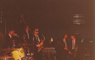 Derby Gig - Five band members in between songs