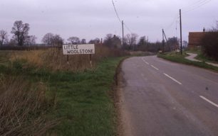 LITTLE WOOLSTONE road sign