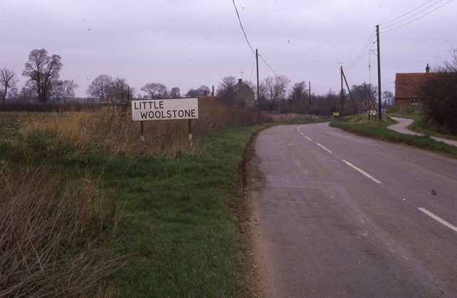 LITTLE WOOLSTONE road sign