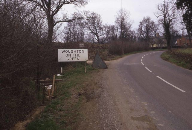 WOUGHTON ON THE GREEN road sign