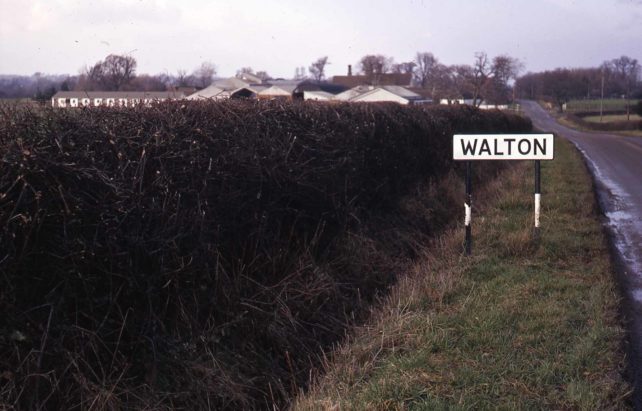 WALTON village road sign
