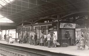 Bletchley Station Platform with Axford's Advertisement
