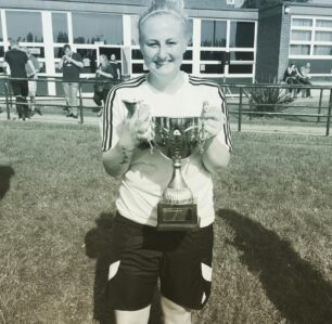 Bianca with a team trophy