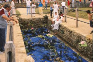 Children by artificial pond