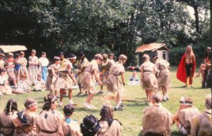Group performs a ritual in a circle