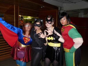Four superheroes in the foyer