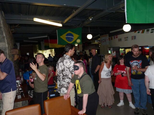 A group of people in the bar area