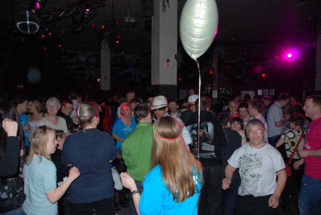 A group of people on the dance floor