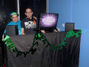 DJ Pete and a crew member at the sound desk