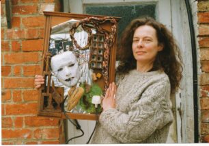 Lady showing her window box artwork
