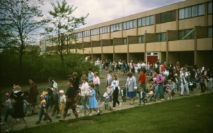 The goodbye parade of parents and children passing Fishermead houses