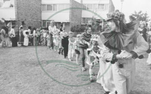 Outdoor party with clowns & fancy dress at the Lakes Estate summer 1975